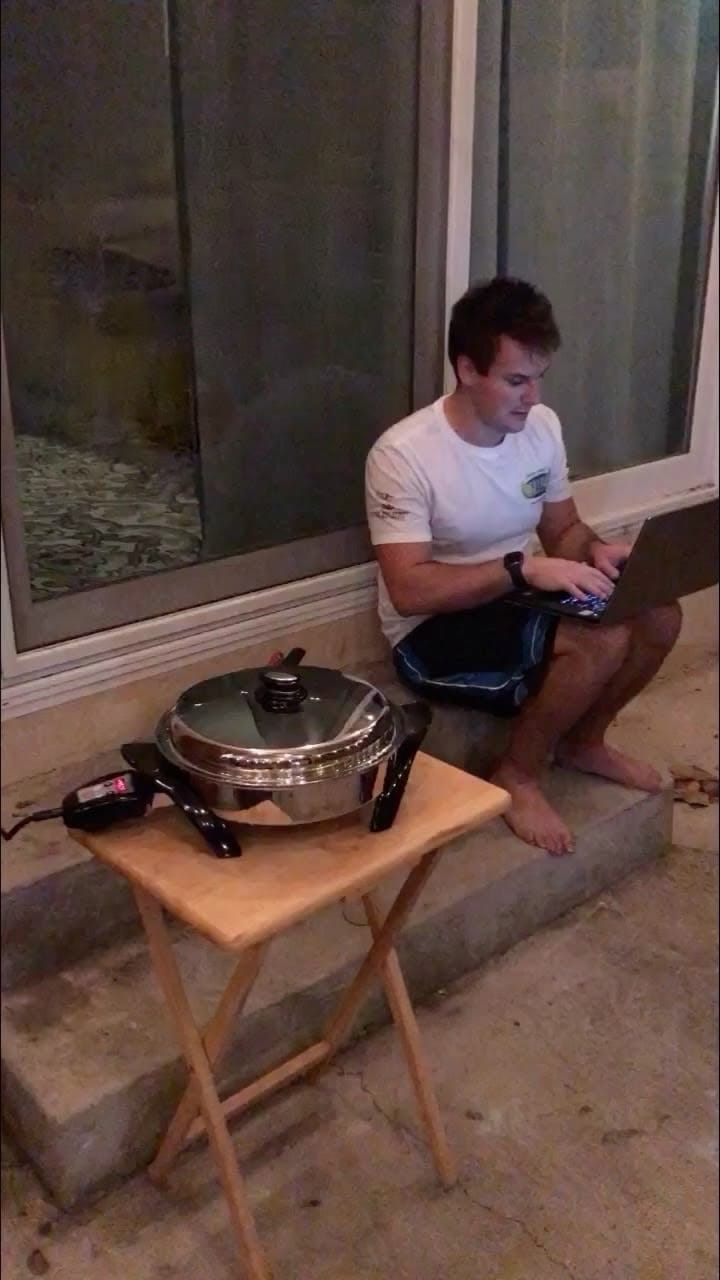 Jesse experimenting with roasting coffee in a skillet on the patio