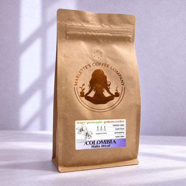 Marlette’s Colombia Huila Sugarcane Decaf coffee bag against a muted lavender studio background